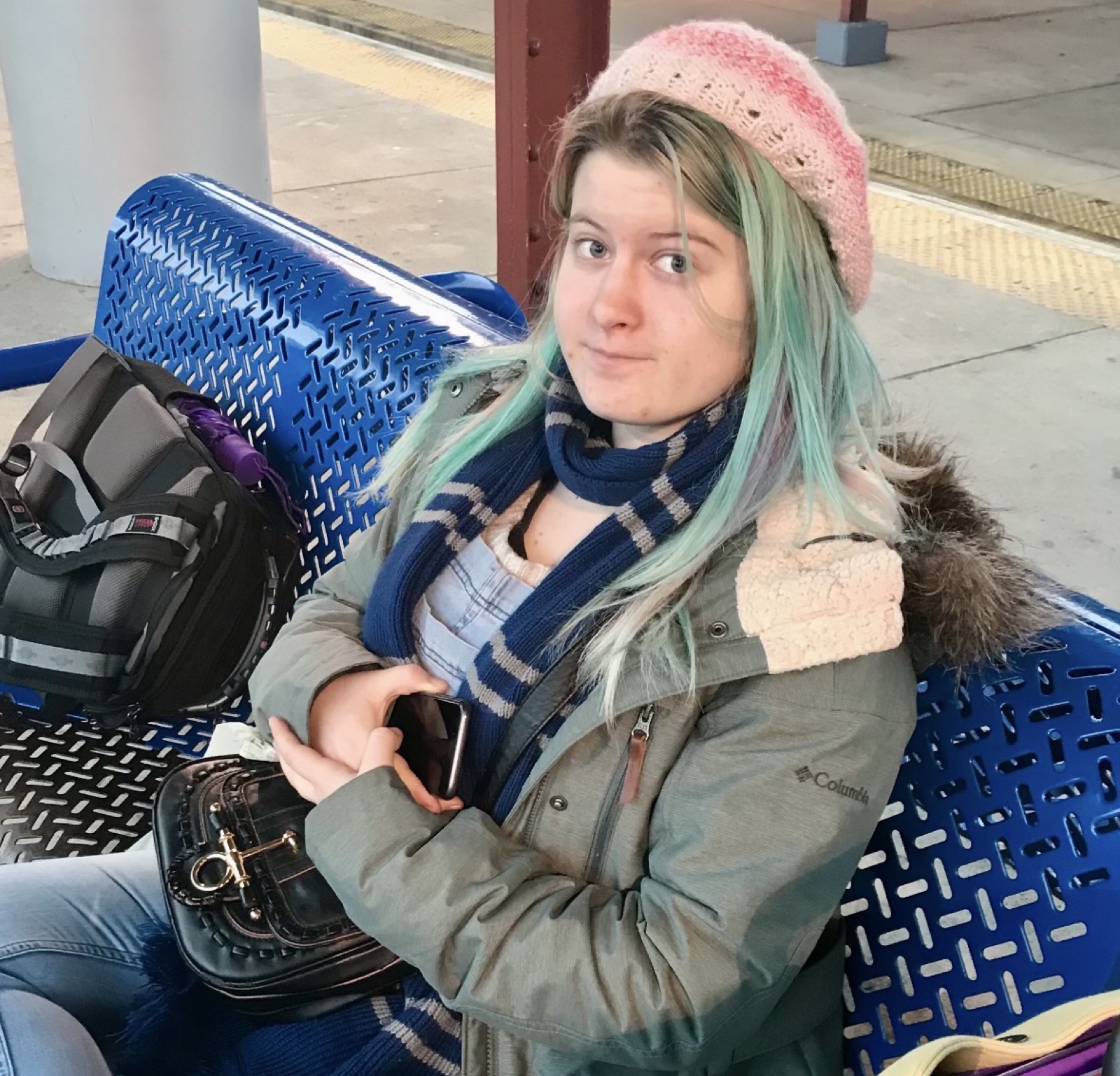 Emily sitting on a bench